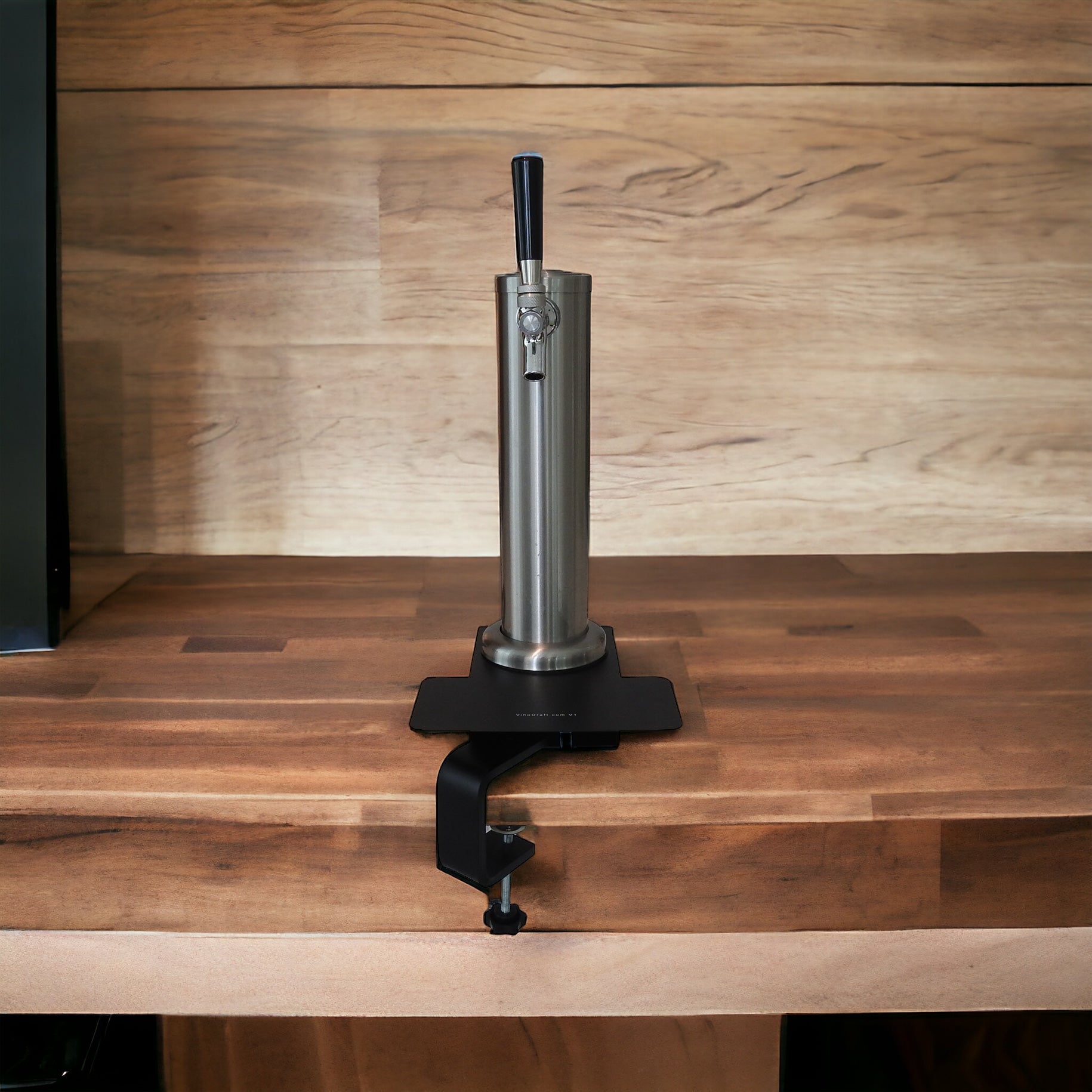 Single faucet clamp-on draft tower on wood bar background fo portable draft beverages like beer, wine and cocktails, by Add-A-Tap